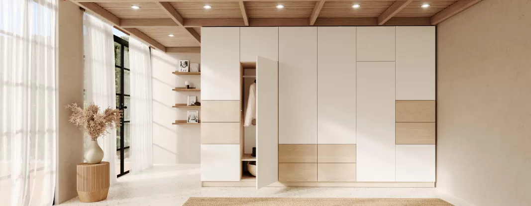 Wardrobe in high-gloss white with a mirrored door